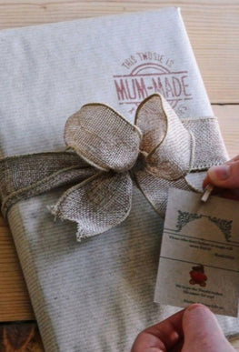Babyboss gift wrapping with brown paper and ribbon tie